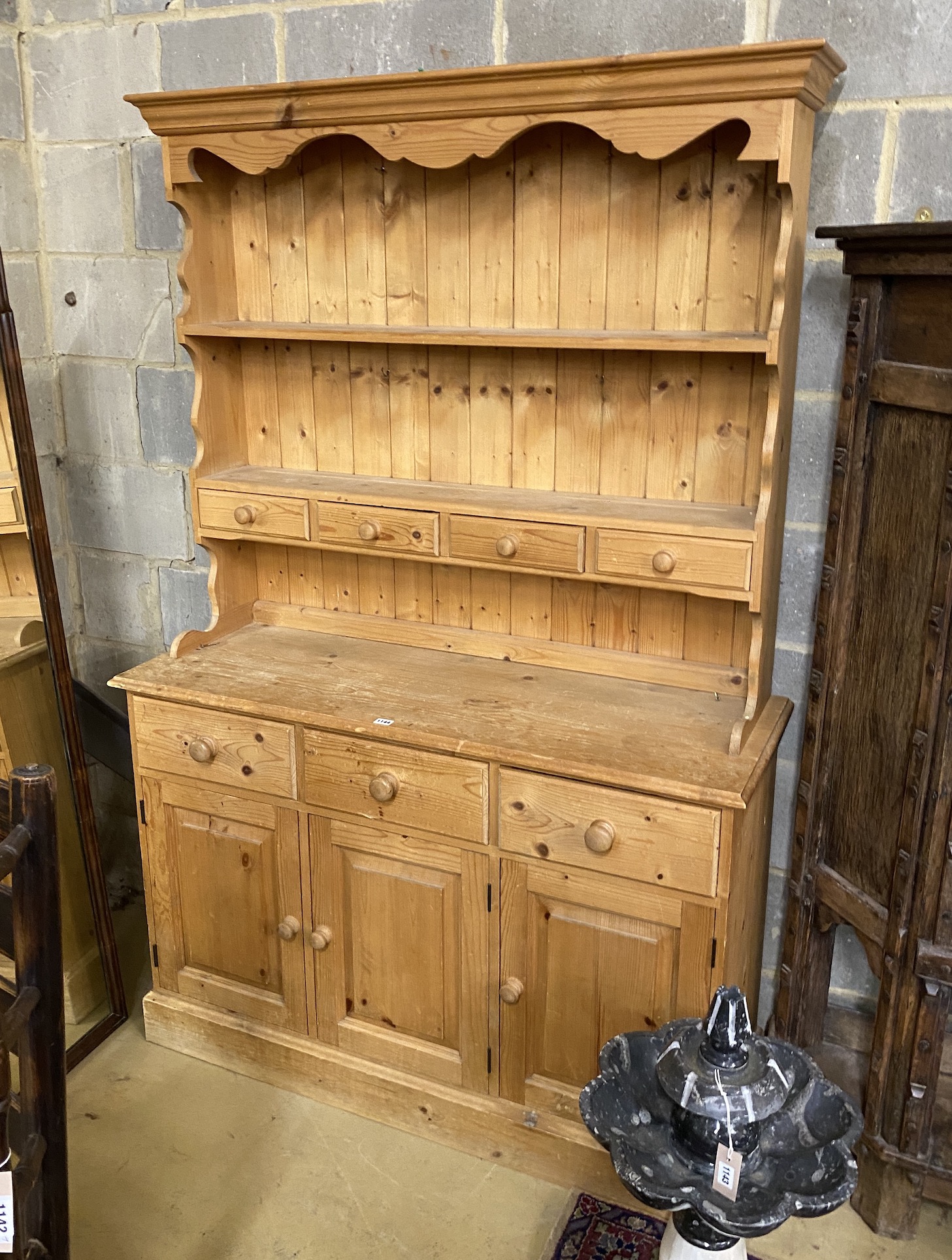 A Victorian style pine dresser, length 122cm, depth 44cm, height 188cm